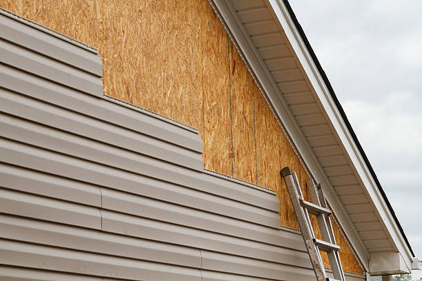 Professional Vinyl Siding technician working in Okeana, OH